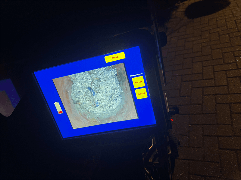 CCTV survey revealing drain blockage in school pipe