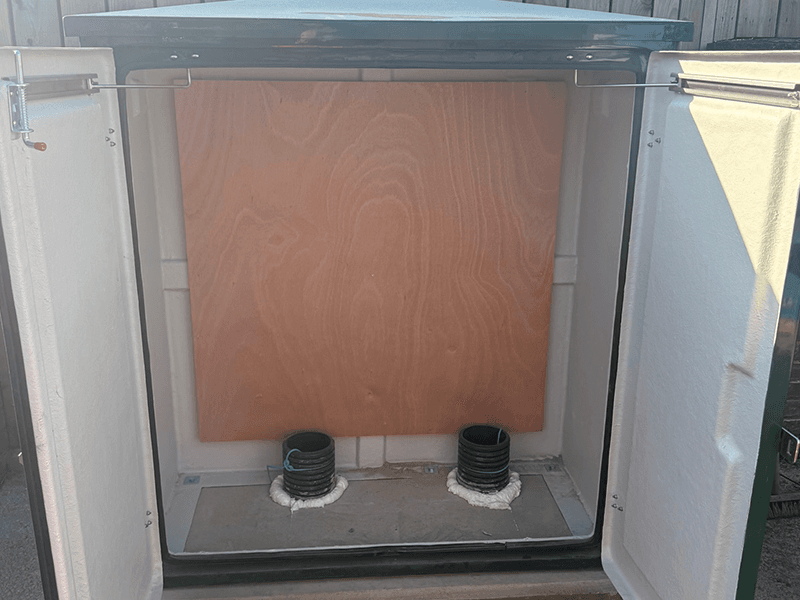 School drainage access cabinet open for inspection